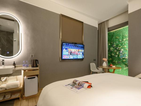 Lux Cabins Hotel Shenzhen : photo 2 de la chambre chambre lit king-size classique