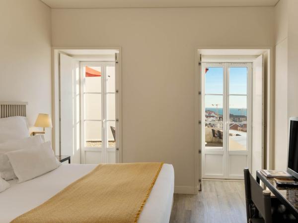 Memmo Alfama - Design Hotels : photo 1 de la chambre chambre double ou lits jumeaux avec terrasse
