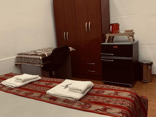 Andino BnB : photo 2 de la chambre chambre double ou lits jumeaux avec salle de bains privative