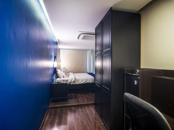 The V Sadan : photo 3 de la chambre chambre lit king-size