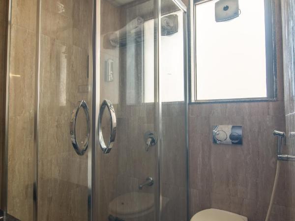 The V Sadan : photo 1 de la chambre chambre lit king-size