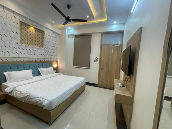 Hotel Abhinandan Palace : photo 5 de la chambre chambre deluxe