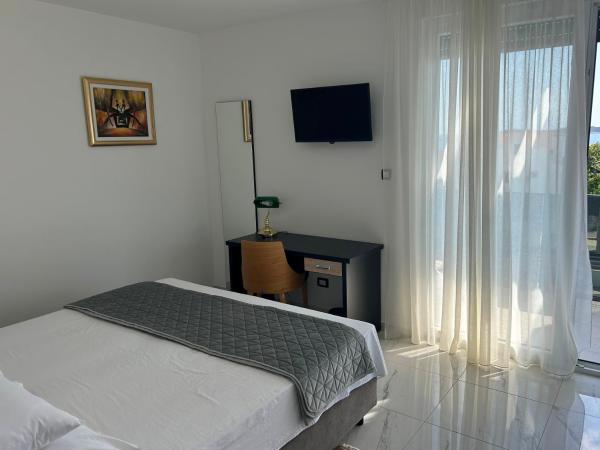 VILLA JANE INN : photo 8 de la chambre chambre double ou lits jumeaux deluxe avec balcon - vue sur mer