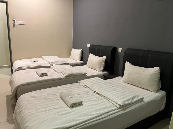 Gebeng Industrial Park Budget Hotel : photo 5 de la chambre chambre triple confort avec douche