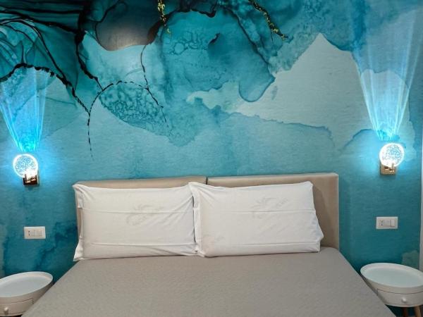 Le Corti del Re : photo 2 de la chambre chambre double ou lits jumeaux deluxe - vue sur ville