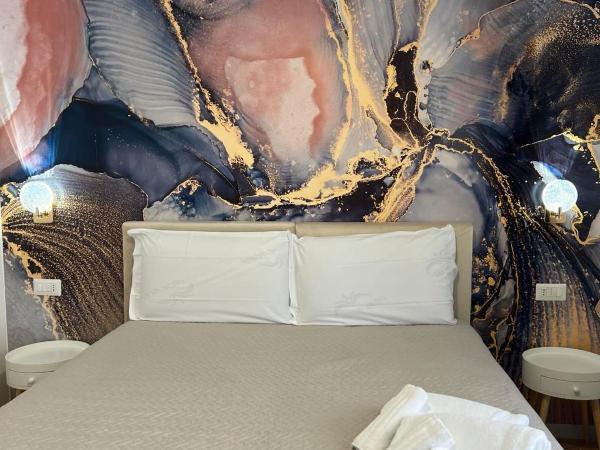 Le Corti del Re : photo 1 de la chambre chambre double ou lits jumeaux deluxe - vue sur ville