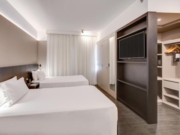 Radisson São Paulo Paulista : photo 1 de la chambre chambre lits jumeaux deluxe