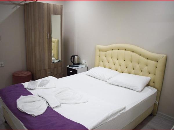 Kümbet Hotel : photo 7 de la chambre chambre familiale avec salle de bains privative