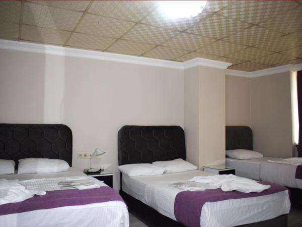 Kümbet Hotel : photo 2 de la chambre chambre familiale avec salle de bains privative