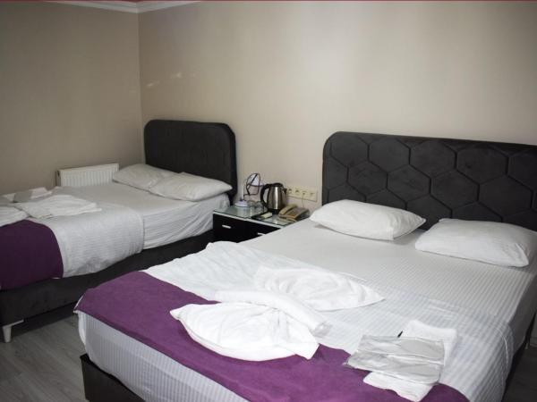 Kümbet Hotel : photo 3 de la chambre chambre familiale avec salle de bains privative