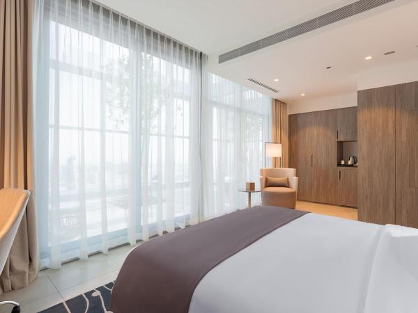 The First Collection at Jumeirah Village Circle, a Tribute Portfolio Hotel : photo 1 de la chambre skyline terrace room with nest club lounge and soluna beach club access