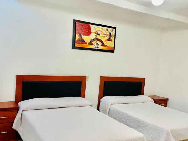 Hotel en Guadalajara Posada Mi Rey : photo 1 de la chambre chambre lits jumeaux