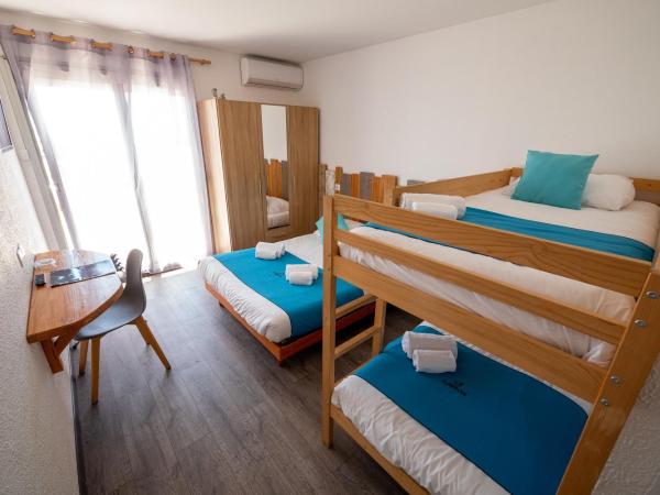 Sunrise Beach Hotel : photo 1 de la chambre chambre quadruple