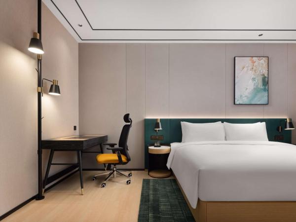 Hilton Garden Inn Chengdu Chunxi Road Center : photo 1 de la chambre suite deluxe avec lit king-size