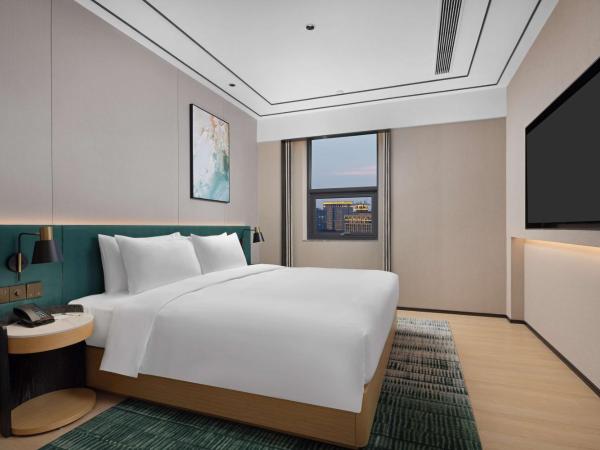 Hilton Garden Inn Chengdu Chunxi Road Center : photo 3 de la chambre suite deluxe avec lit king-size