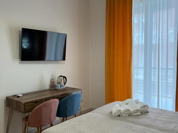 Le Corti del Re : photo 4 de la chambre chambre double ou lits jumeaux deluxe - vue sur ville