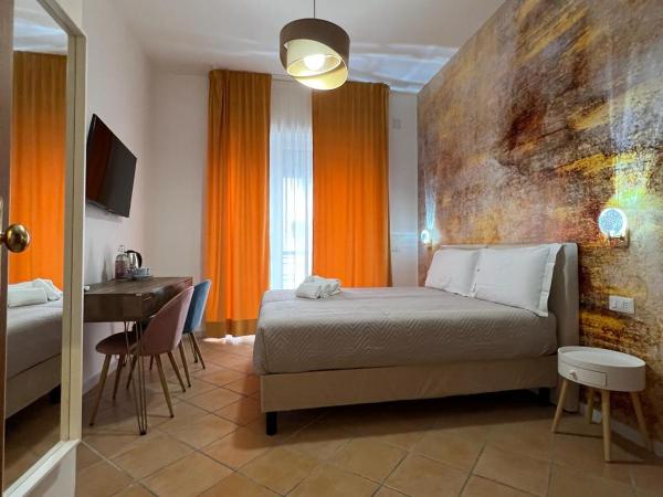 Le Corti del Re : photo 3 de la chambre chambre double ou lits jumeaux deluxe - vue sur ville