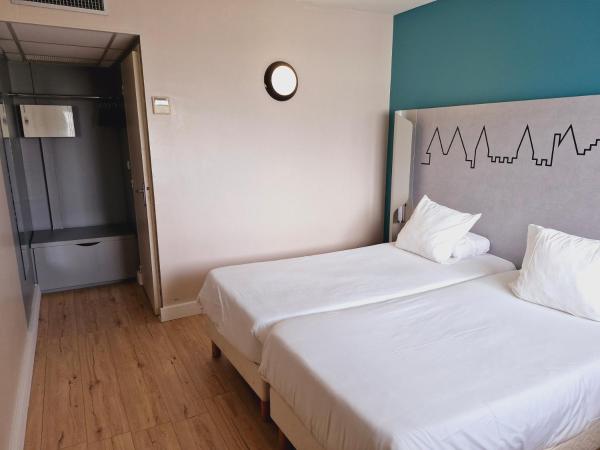 Kyriad Carcassonne - Aéroport : photo 2 de la chambre chambre lits jumeaux standard