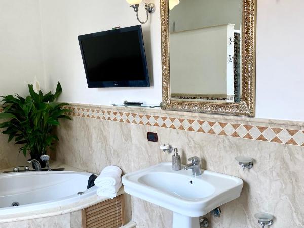 Camera matrimoniale con idromassaggio : photo 2 de la chambre chambre double avec salle de bains privative