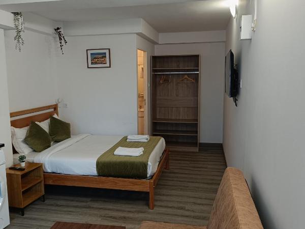 LISABONNA GUEST HOUSE : photo 5 de la chambre chambre double avec lit d'appoint