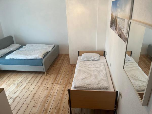 Waldschlösschen Ricklingen : photo 2 de la chambre chambre triple avec salle de bains