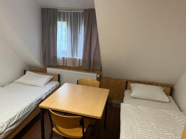 Waldschlösschen Ricklingen : photo 2 de la chambre lit simple dans dortoir mixte