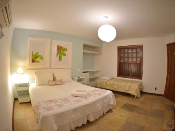 Pousada Blanca Inn : photo 1 de la chambre chambre triple - vue sur jardin