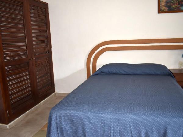 Hotel Plaza Almendros : photo 2 de la chambre chambre quadruple supérieure