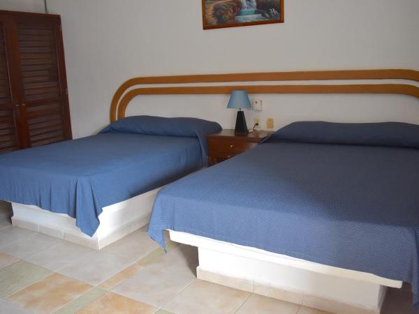 Hotel Plaza Almendros : photo 9 de la chambre chambre quadruple supérieure