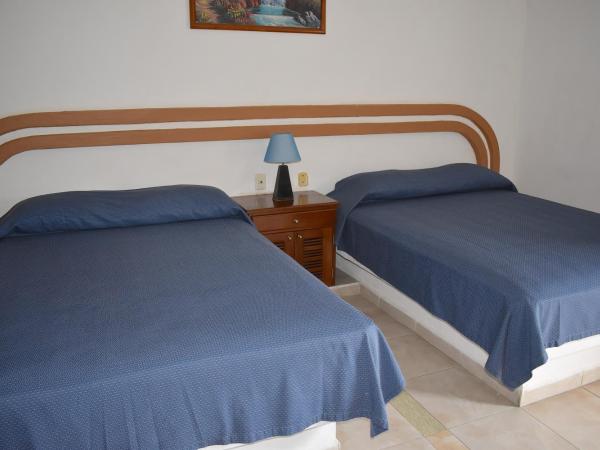 Hotel Plaza Almendros : photo 4 de la chambre chambre quadruple supérieure