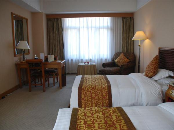 Qingdao Oceanwide Elite Hotel : photo 2 de la chambre chambre lits jumeaux exécutive avec vue sur ville