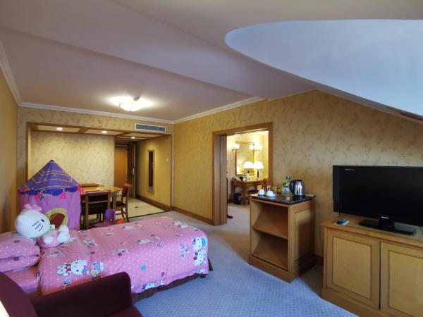 Qingdao Oceanwide Elite Hotel : photo 3 de la chambre suite parent-enfant