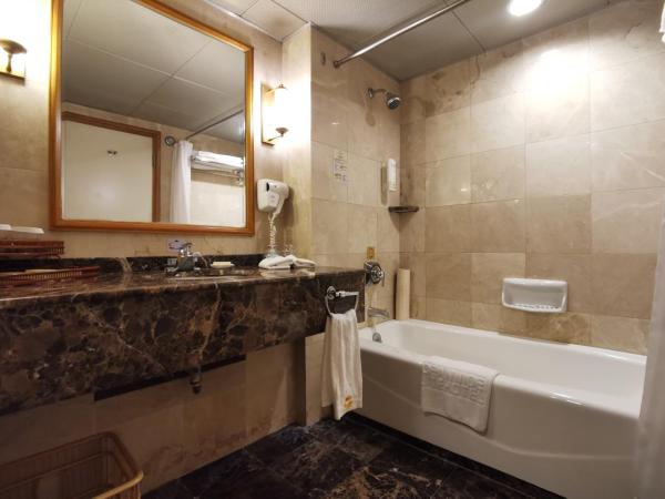 Qingdao Oceanwide Elite Hotel : photo 4 de la chambre suite parent-enfant