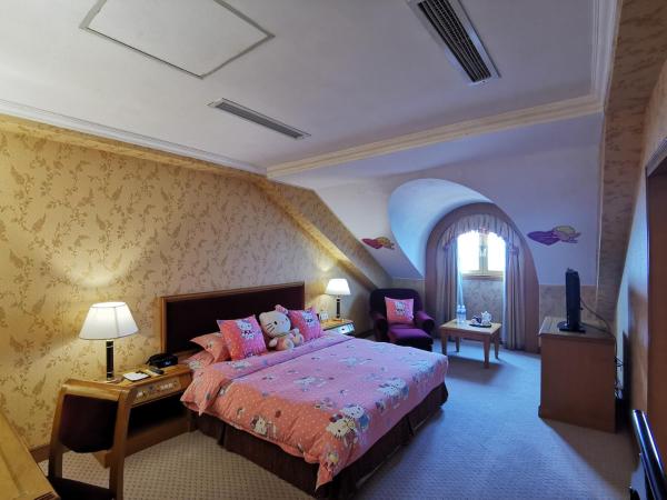 Qingdao Oceanwide Elite Hotel : photo 1 de la chambre suite parent-enfant