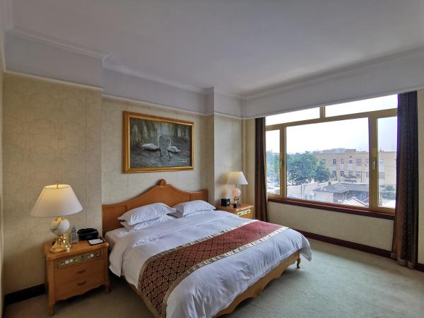 Qingdao Oceanwide Elite Hotel : photo 1 de la chambre suite deluxe