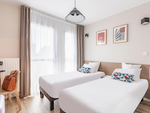 Appart'City Confort Angers : photo 2 de la chambre studio lits jumeaux