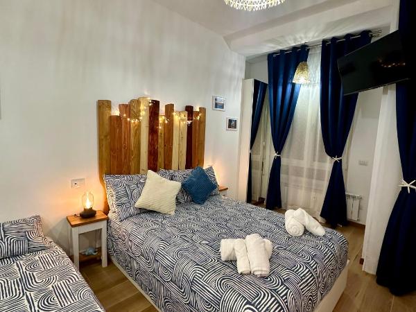 Due Mari Milano Apartment ZONA PORTELLO-FIERA FREE WI-FI : photo 8 de la chambre chambre double avec balcon (3 adultes)