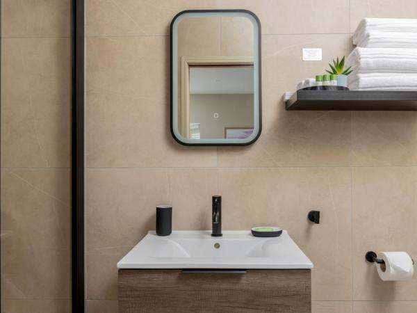 Kings Road Suites : photo 5 de la chambre chambre lit king-size supérieure