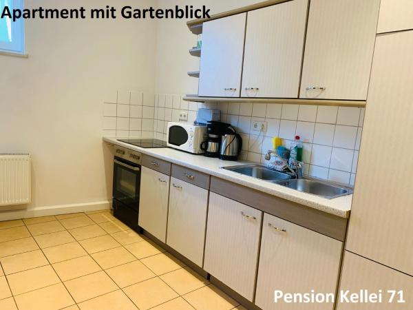 Pension Kellei 71 : photo 6 de la chambre appartement - vue sur jardin