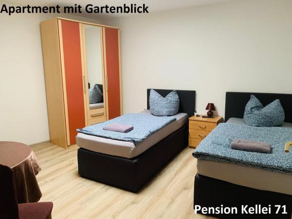 Pension Kellei 71 : photo 5 de la chambre appartement - vue sur jardin
