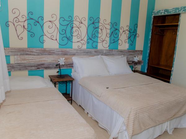 Pousada Peninsula de Buzios : photo 1 de la chambre chambre triple deluxe