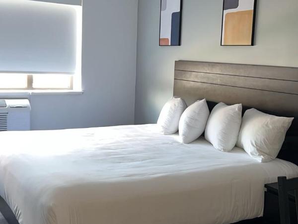 Hotel Newstar Montréal : photo 6 de la chambre chambre lit king-size supérieure avec kitchenette