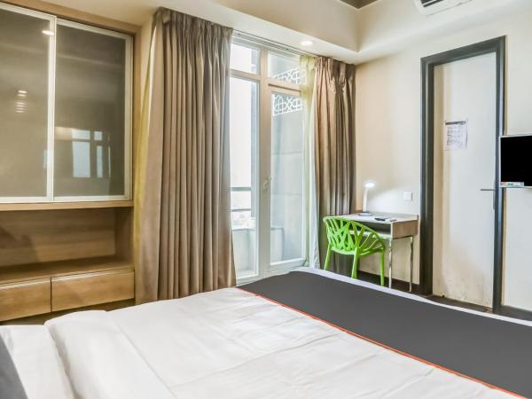 Collection O Limewood Stay : photo 5 de la chambre chambre triple avec vue