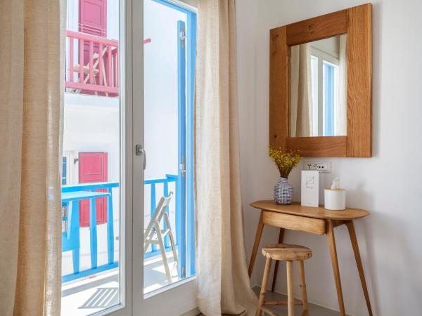 Bluetopia Suites : photo 7 de la chambre suite junior avec vue sur la ville