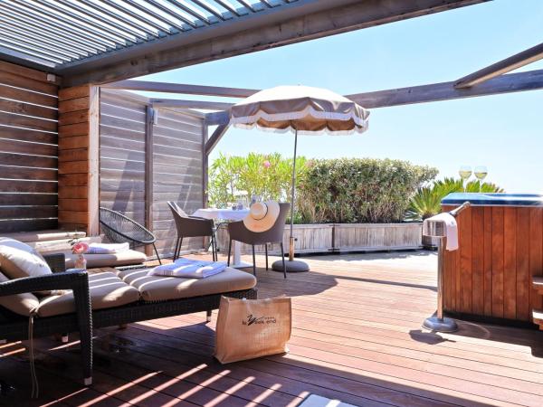 Hôtel Le Week end : photo 5 de la chambre suite lit king-size - vue sur mer