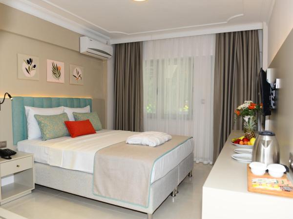 ROSE GARDEN PREMIUM : photo 7 de la chambre chambre double ou lits jumeaux standard avec balcon