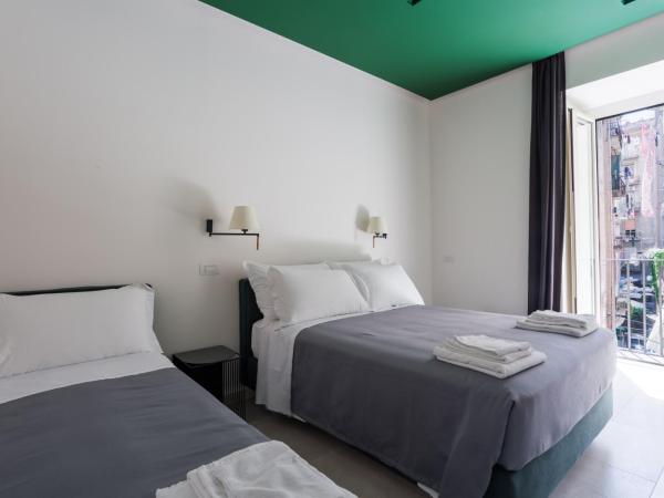 Weaver Suites By Dimorra : photo 4 de la chambre chambre triple