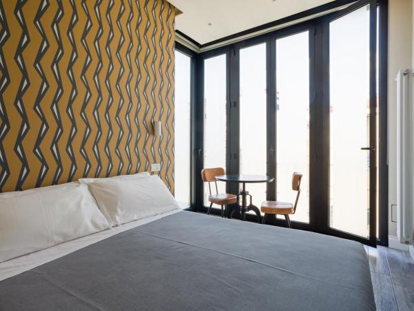 Weaver Suites By Dimorra : photo 7 de la chambre chambre lit king-size