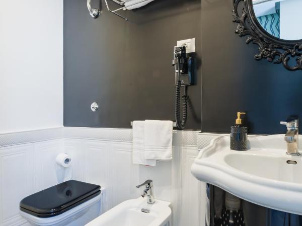 Weaver Suites By Dimorra : photo 6 de la chambre chambre triple exécutive