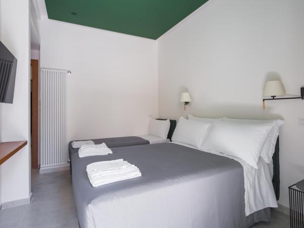 Weaver Suites By Dimorra : photo 6 de la chambre chambre triple